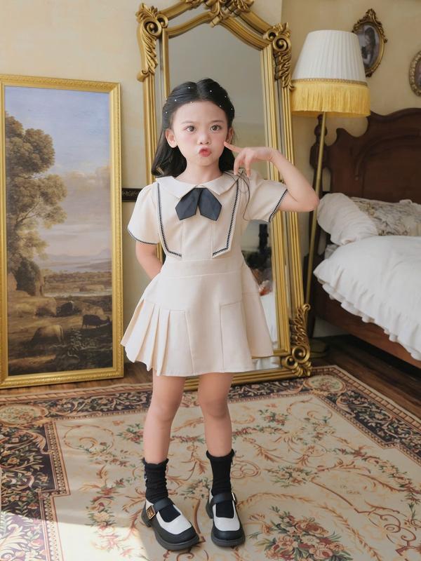 Váy công chúa cho bé gái Lona dress - Xếp Ly kem nơ đen HOMI BABY HOUSE phukien so
