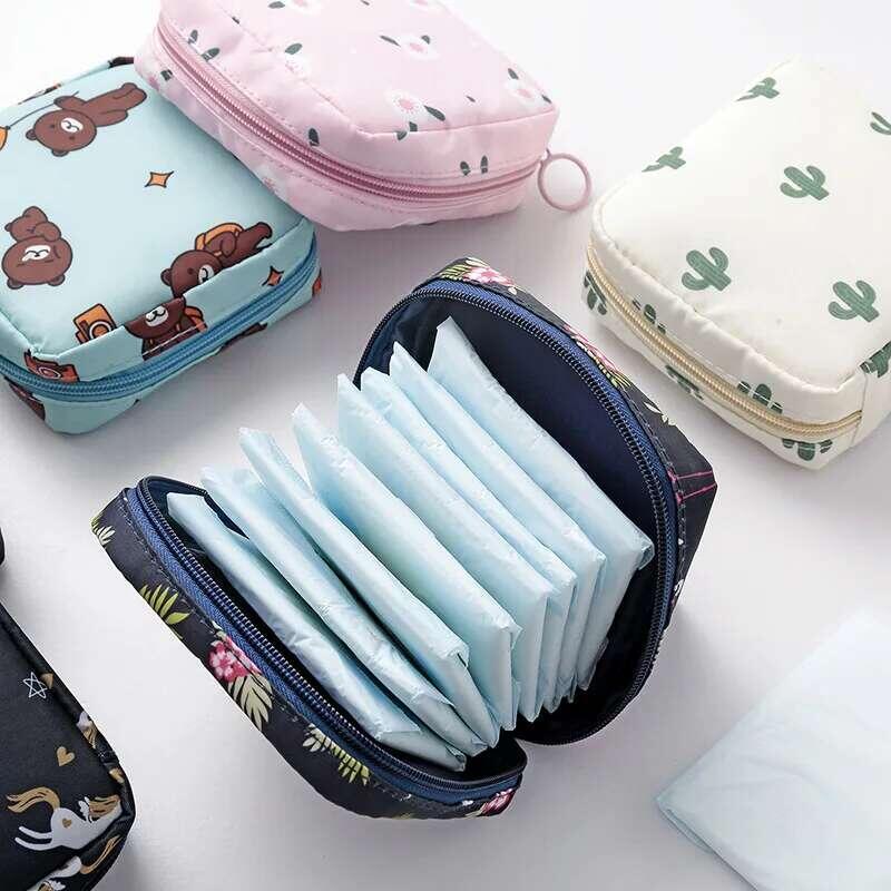 Product Introduction of Women Tampon Storage Portable Waterproof Organizer Pouch Cartoon Pattern Sanitary Napkin Bag 0