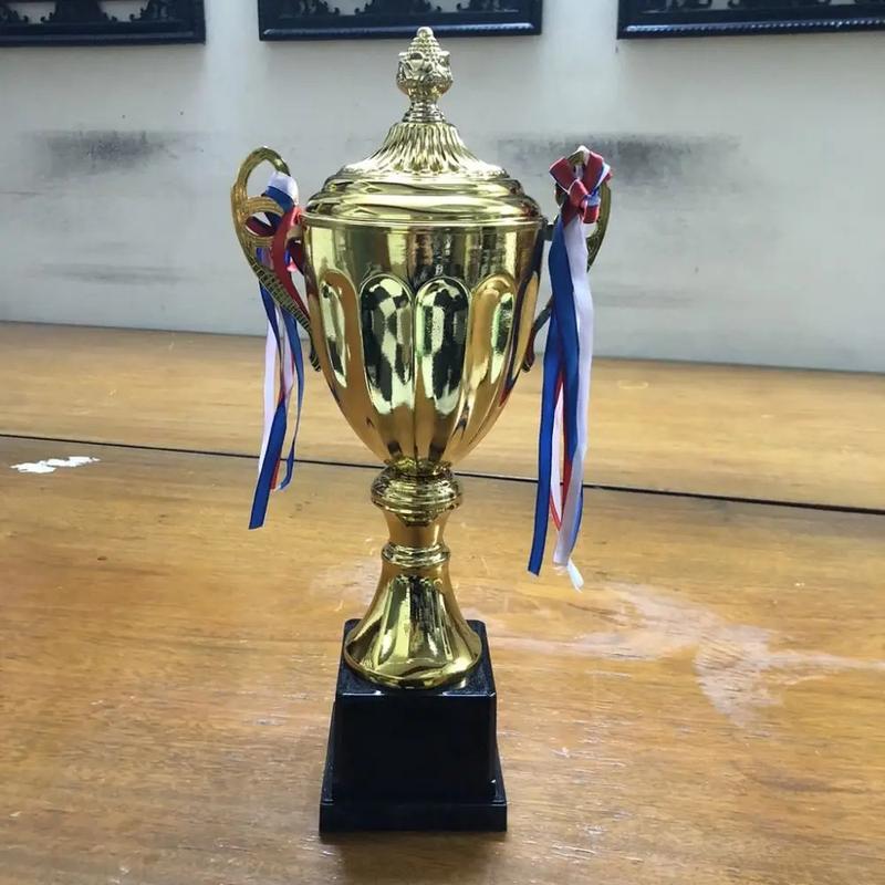 Product Introduction of Sports Games Gold Trophy Awards Champion Metal Model Small Prize Cup with Lid School Rewarding Supply Winner Award Trophy Toy 3