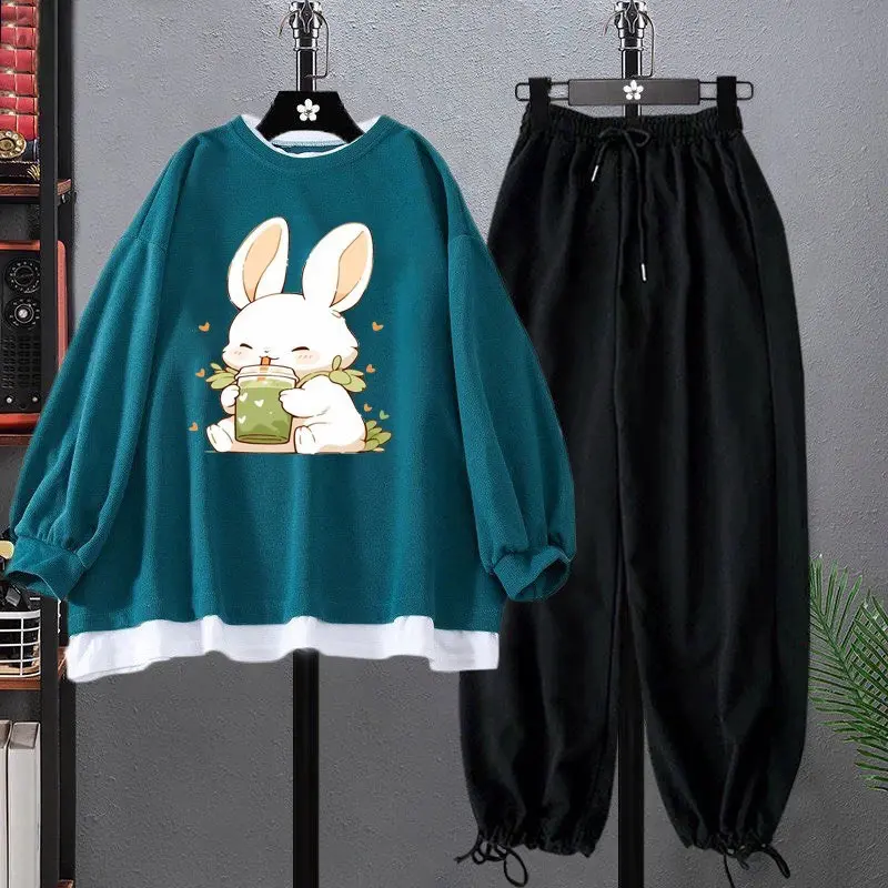 Sét Sweater phối gấu trắng in hình thỏ hút trà, kèm quần bom dây rút, sét bộ nữ mặc đi chơi đi học. Áo Kem