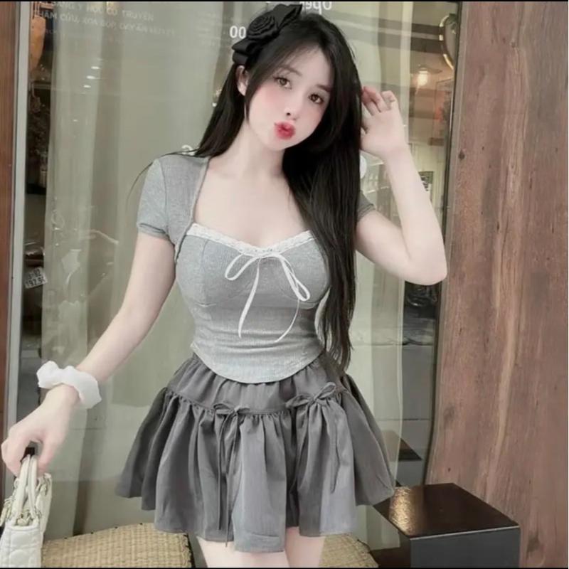 Sét bộ đồ áo thun vạt lượn phối ren kèm chân váy đính nơ có lớp lót- Hân linh
