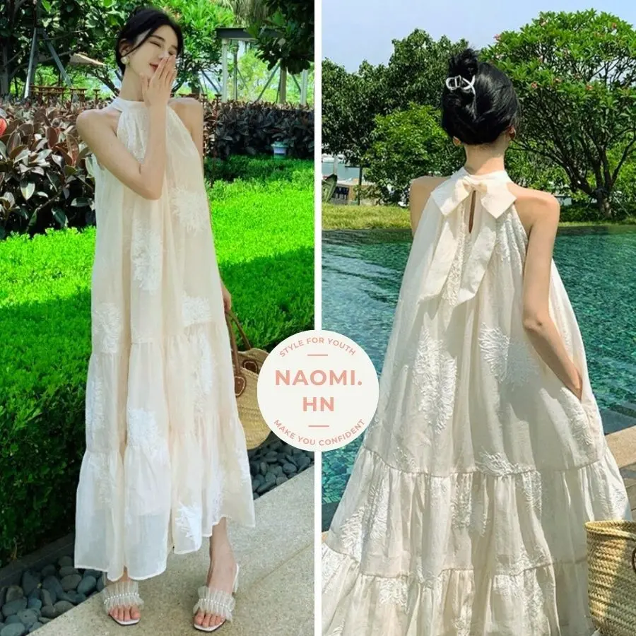 Váy maxi cổ yếm dáng dài thêu hoa ren nổi buộc nơ sau sang chảnh. Đầm dáng dài đi chơi đi biển 2 tầng tiểu thư Nữ Kem