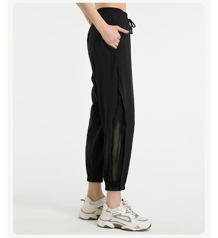 Product Introduction of Loose high-waisted quick-drying pants European and American mesh quick-drying yoga trousers running sports tied feet large-size fitness pants women 17