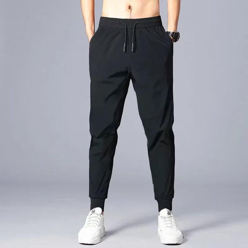 Quần Thể Thao Nam Jogger Đen Trơn Phối Sọc Vải Thun Poly 2 Da Co Giãn 4 Chiều…