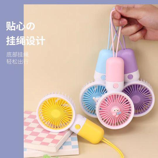 Product Introduction of Quạt mini cầm tay, tích điện, nhỏ gọn xinh xắn, có đế để điện thoại, sạc usb và sticker 2