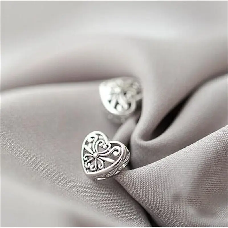 New Fashion Flower Personality Heart Shaped Hollow For Women Exquisite Stud Earrings  E009