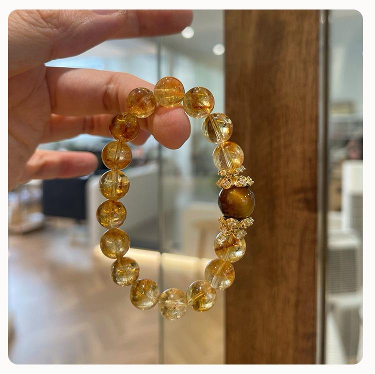 Product Introduction of Natural Yellow Pagoda Crystal Tiger Eye Stone Unique Niche Wealth-Attracting Bracelet for Women Large Round Beads Accessories Wholesale from Manufacturer 6