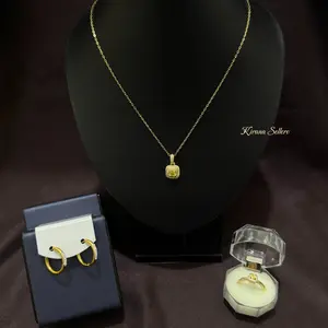 Kalung Batu Permata Kuning Kotak dan Cincin Luz Adjustable dan Anting Hoop Titanium Gaya Mewah dan Anggun Kirana Sellero