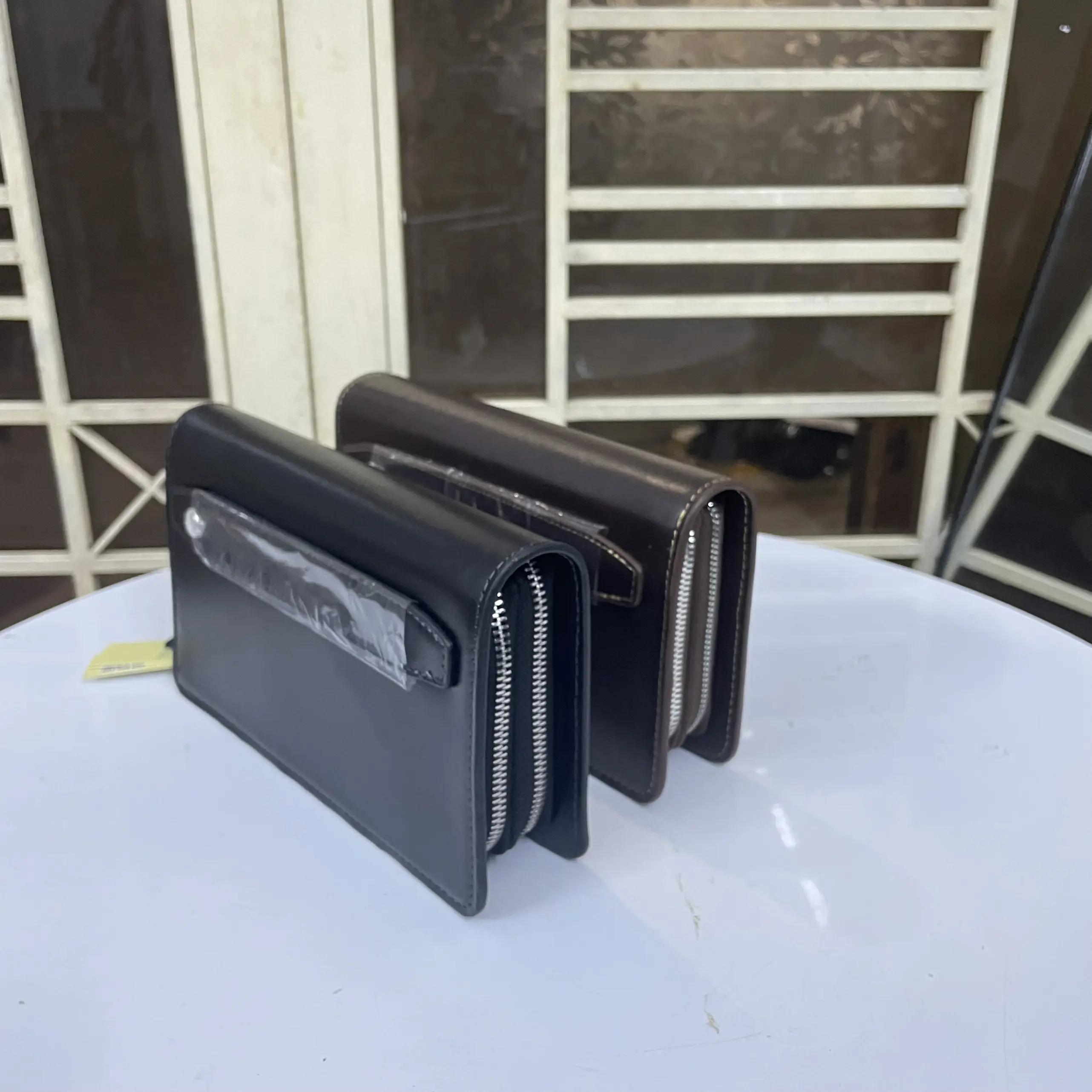Ví cầm tay da bò trơn 2 ngăn khoá kéo - VCT01