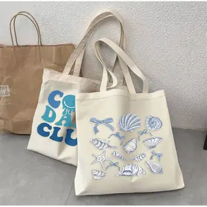 Stylish and versatile canvas bag | Great for work, shopping, and travel, and it even comes with a blue tulip design. tooth