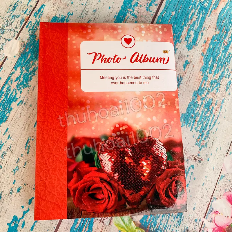 Album đựng 200 ảnh 15x21 bìa giấy cứng 2 ngăn ( đựng ảnh A5 ) 0