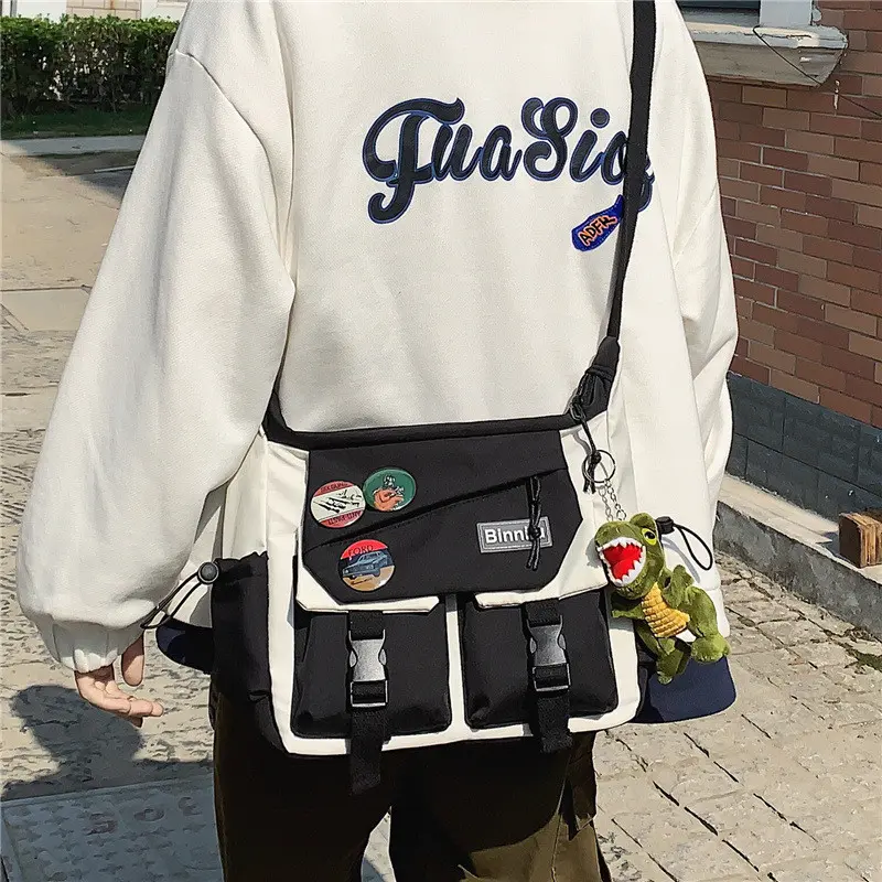 【COD】Tas travel untuk pria dan wanita/tas bahu/tas kanvas/unisex/tas kasual/tas fashion Korea berkapasitas besar/tas bahu impor/temperamen kasual/tas kasual pasangan/2 gaya untuk dipilih 2