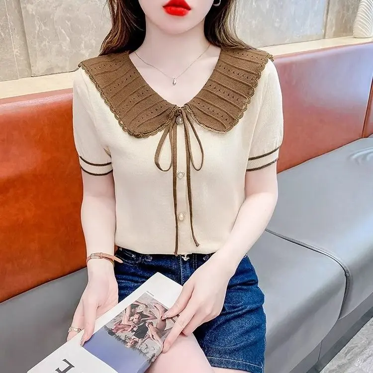เสื้อสเวตเตอร์แขนสั้นผู้หญิง คอลเลคชั่นใหม่ฤดูร้อนปี 2024 เสื้อถักแขนสั้น คอปกตุ๊กตาโบว์ ดีไซน์ผูกเชือก ทันสมัยและหลากหลาย เสื้อเรียบหรู