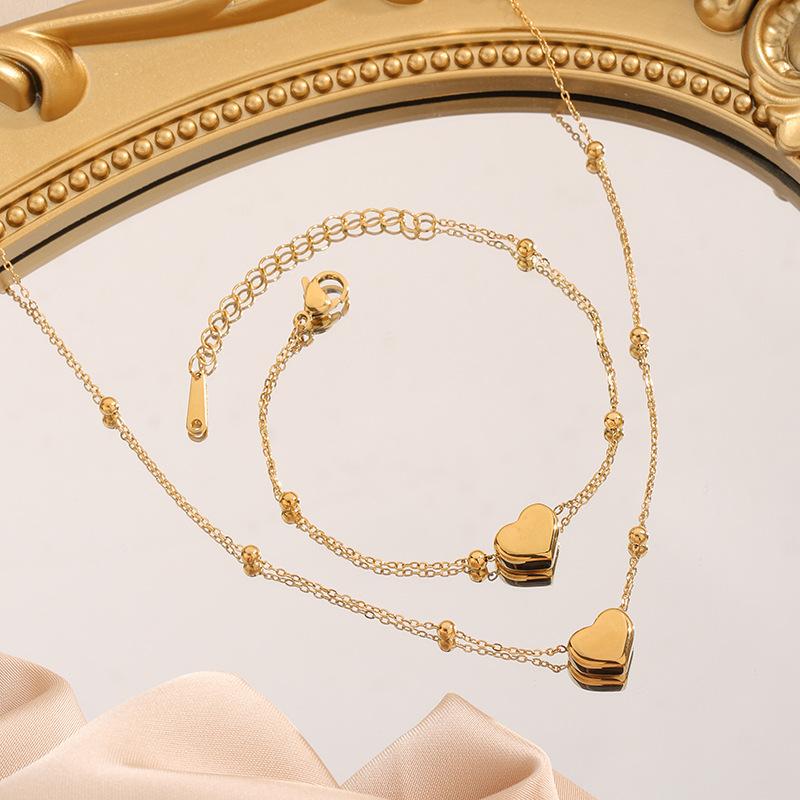 Product Introduction of 1-2 Pcs Love Titanium Steel Necklace+Bracelet with Female Niche Design 18K Gold Lock Bone Chain New Necklace with Accessory Pendant 1