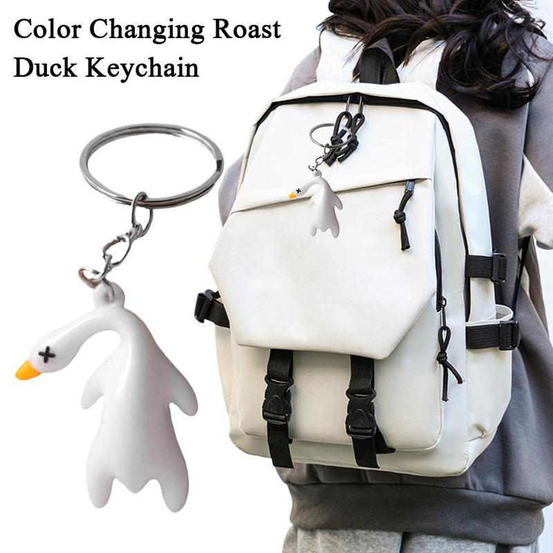 Product Introduction of Funny Color Change Duck Bag Pendant UV Simulation Roast Duck Car Pendants Keyrings For Handbag Accessories Gift 19