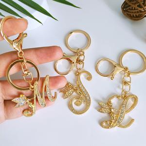 Exquisite Elf Letter Metal Keychains Luxury Gold Color Rhinestone Alphabet Keyrings For Men Women Handbag Ornaments Gifts jade pendant necklace part meteor zodiac sign clover orchid efficascent mother child poison tree igorot 20 chain rings mini chinese