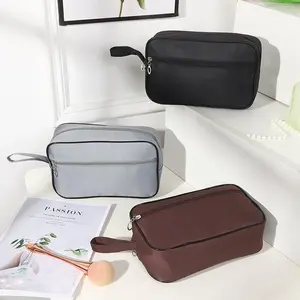 Toiletry Bag Travel Anti Air Kapasitas Besar – Tas perlengkapan mandi portable, cocok untuk menyimpan alat mandi dan kosmetik, tersedia warna hitam/coklat/abu-abu, ideal untuk perjalanan atau bisnis, desain sederhana mudah dibawa【TOPSLINGS】