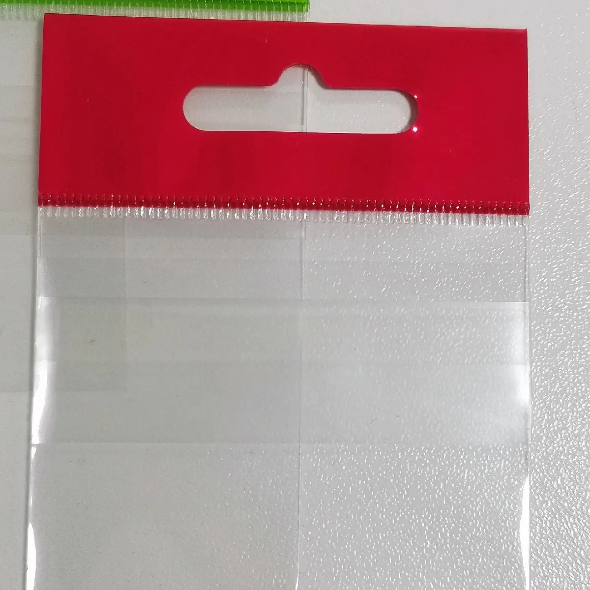 plastik kemasan acc pancing merah isi 100pcs Plastik Plastik Plastik