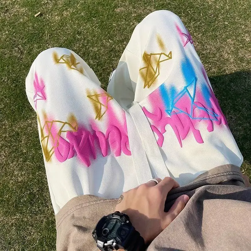 American Hiphop Pants Men's Design Sense XINGX Graffiti Casual Trousers Fashion Brand Loose Straight Sports Trousers Menswear Lingerie Human Tropical