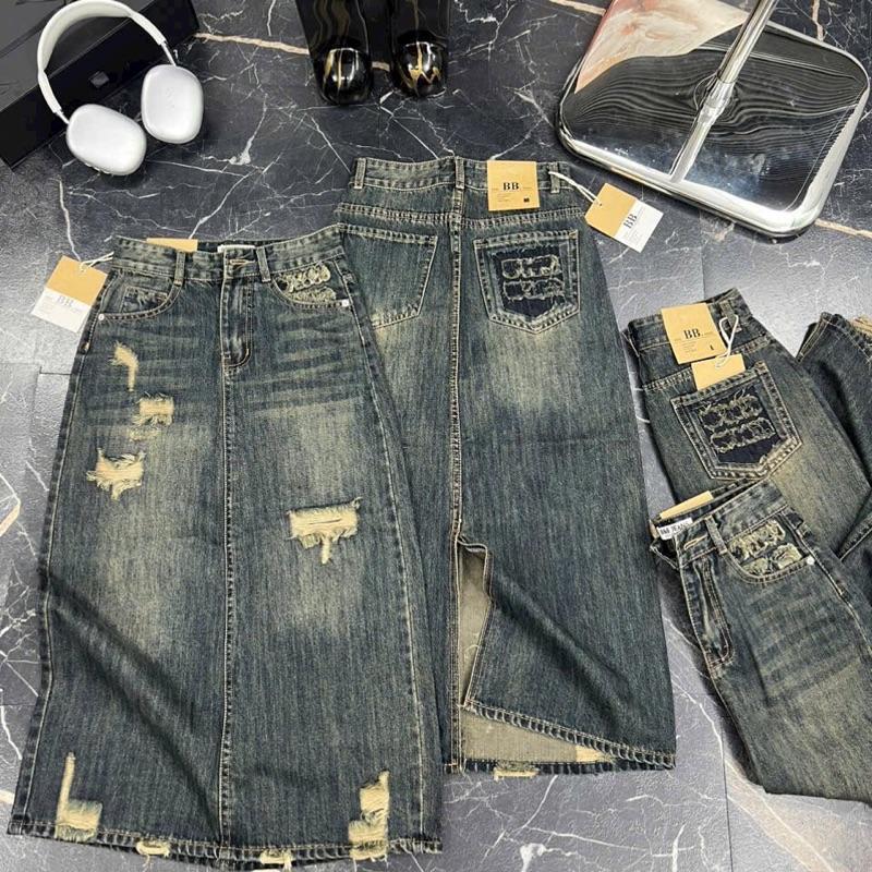 Chân váy jean dáng dài 83cm, thêu hình chất jean QC đanh lì co , màu rêu ánh vàng