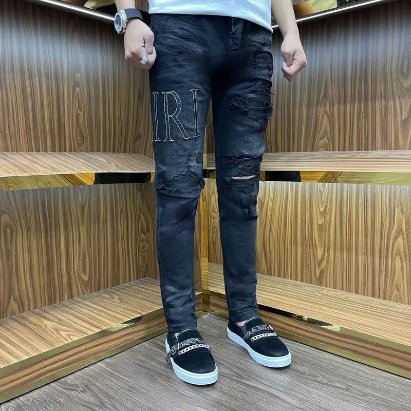 quần Jeans nam  AMR chữ đen túi da sau mông bốn cúc 2