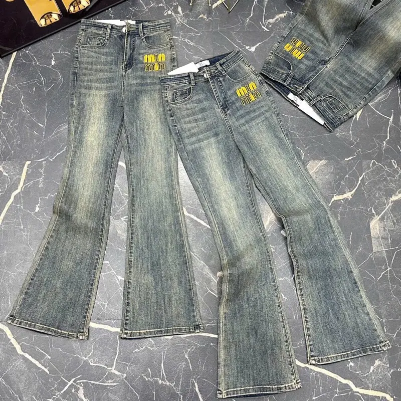 [Loe dài 100cm ] M1462 Quần Jean loe nữ lưng cao màu xanh bụi thêu phía trước 0