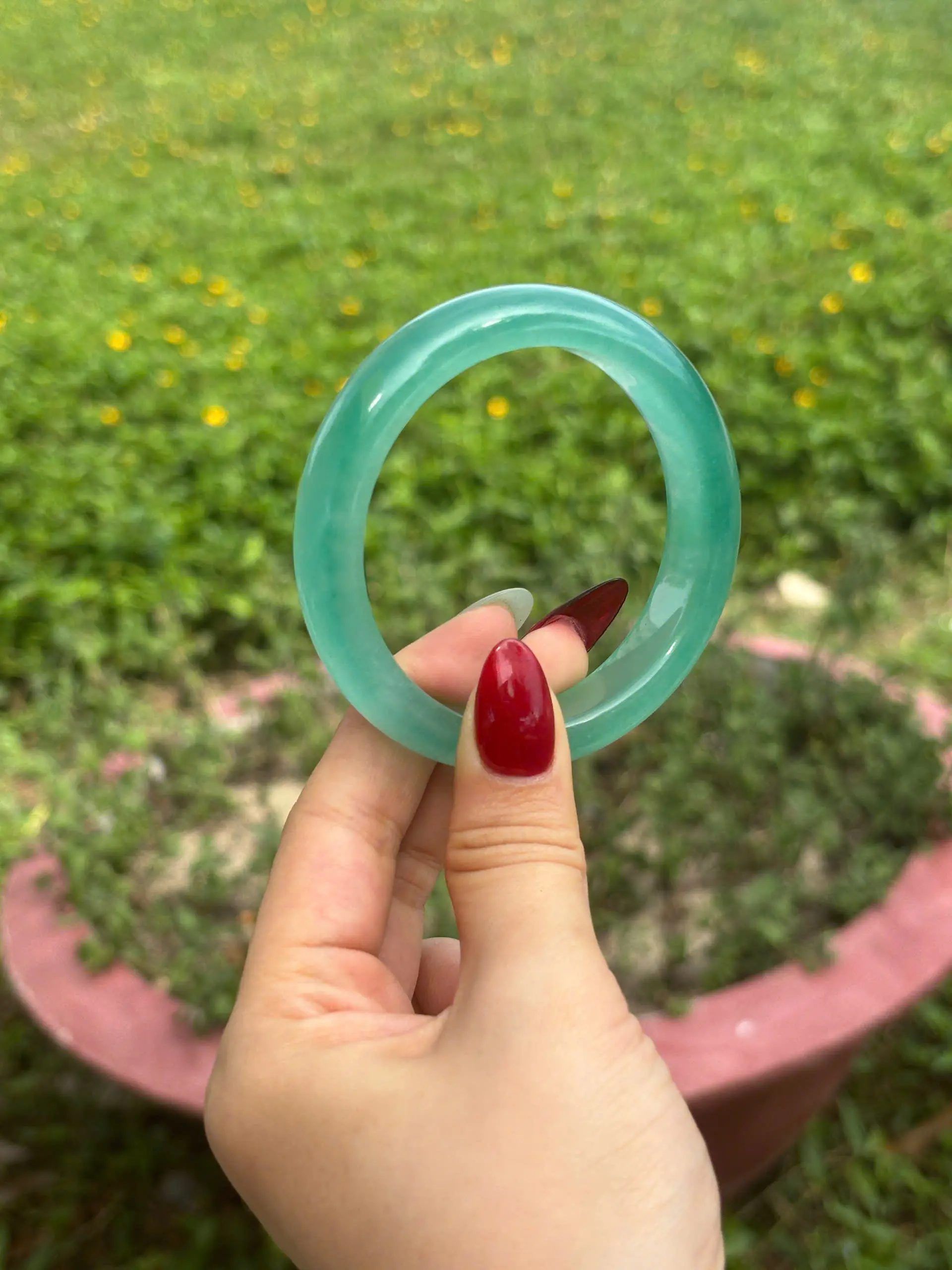 Vòng tay D.L màu xanh lá nhạt bản hẹ