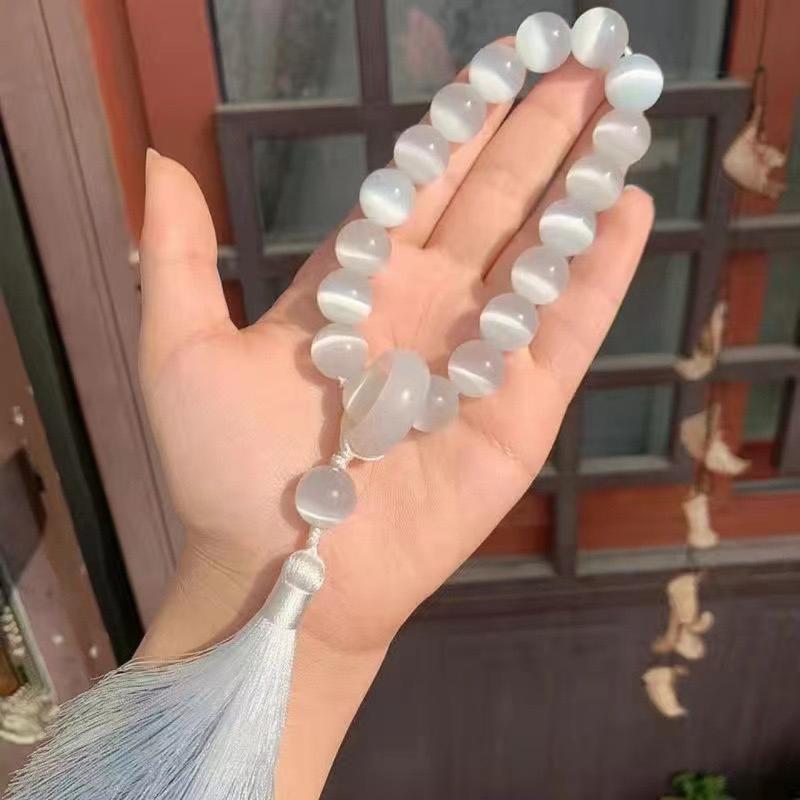 Product Introduction of Ancient Style White Moonlight - Cat's Eye Stone Handheld She Tai Cui Hanfu Tassel Hand Spinner Ancient Style Cultural Play Soft Bracelet for Men 1