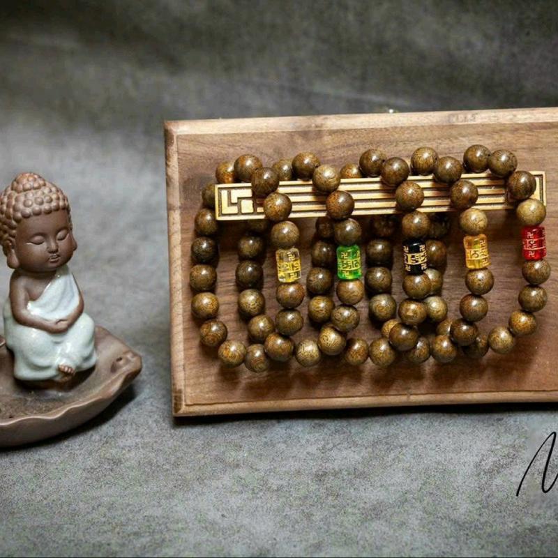 Vòng tay trầm hương mix lu thống theo mệnh, mix charm Sen vàng Bình An, may mắn