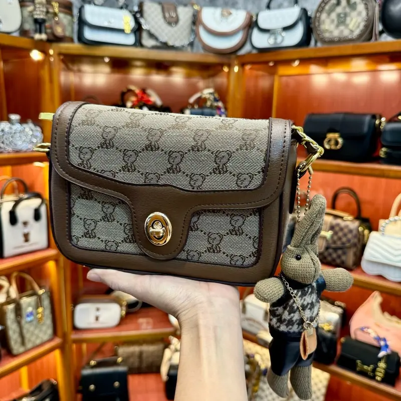 (Tặng thỏ bông)Túi xách nữ,túi đeo chéo,túi đeo vai,túi gấu khoá tròn-m10 Nhung Bag 1
