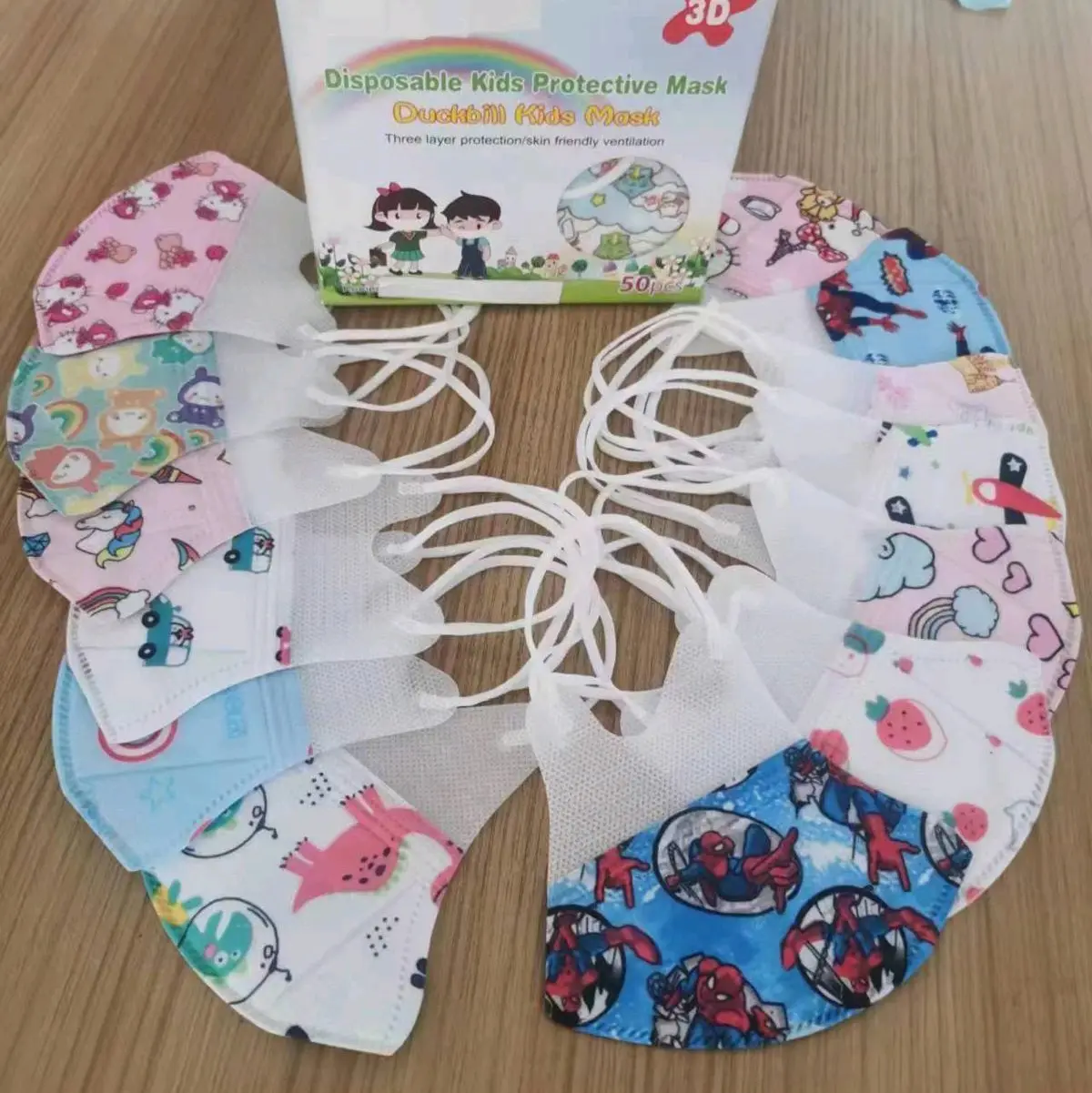 READY DUCKBILL 3 PLY ANAK USIA 4 - 12 TAHUN MERK FACE MASK MOTIF CEWEK COWOK KEMASAN BOX ISI 50 LBR HIGIENIS