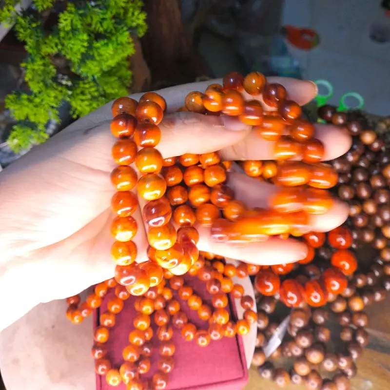VÒNG TAY GỖ HUYẾT LONG THẤU QUANG 7