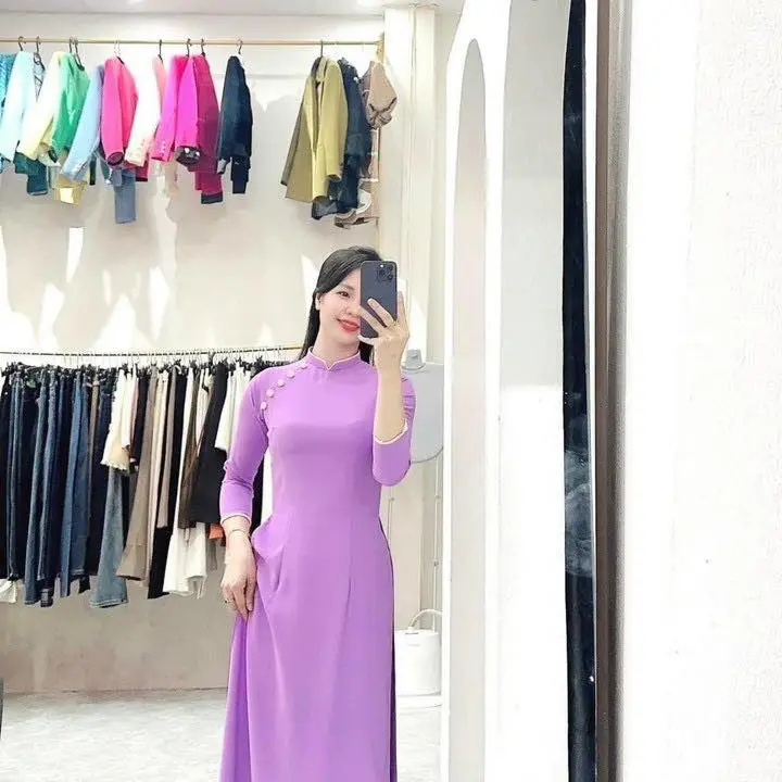 Áo dài trơn đính cúc bọc , viền tay