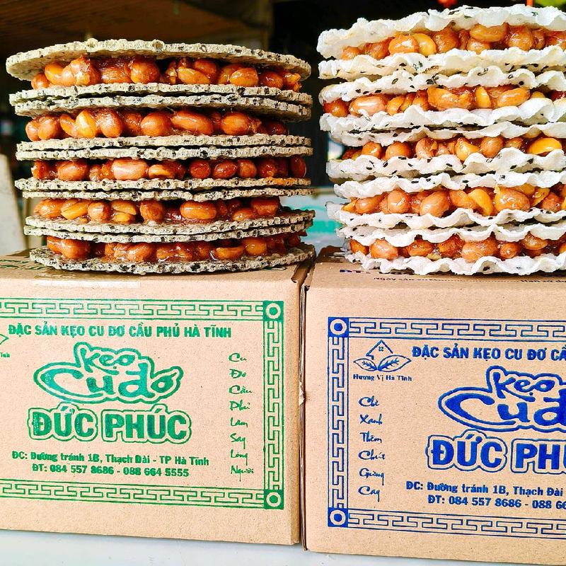 COM BO 2 HỘP KẸO CUDO (1hop truyền thống và 1 hộp đặc biệt mè đen). nặng hơn 1400g(cả hộp),(2 hộp 10 miếng,tặng 1 miếng)  ,Ăn Vặt Snack 9