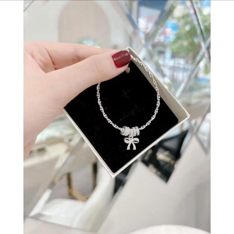 Vòng xoắn bạc S925 mix chaảm nơ SolSilver