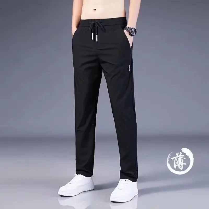Quần Dài Thường Ngày Cho Nam, Mỏng Và Rộng, Nhanh Khô, Được Làm Bằng Lụa Lạnh Thích Hợp Cho Mùa Hè, Quần Thể Thao Lực Lượng, Phong Cách Hợp Xu hướng [Thanh Toán Khi Nhận Hàng & Hàng Có Sẵn]