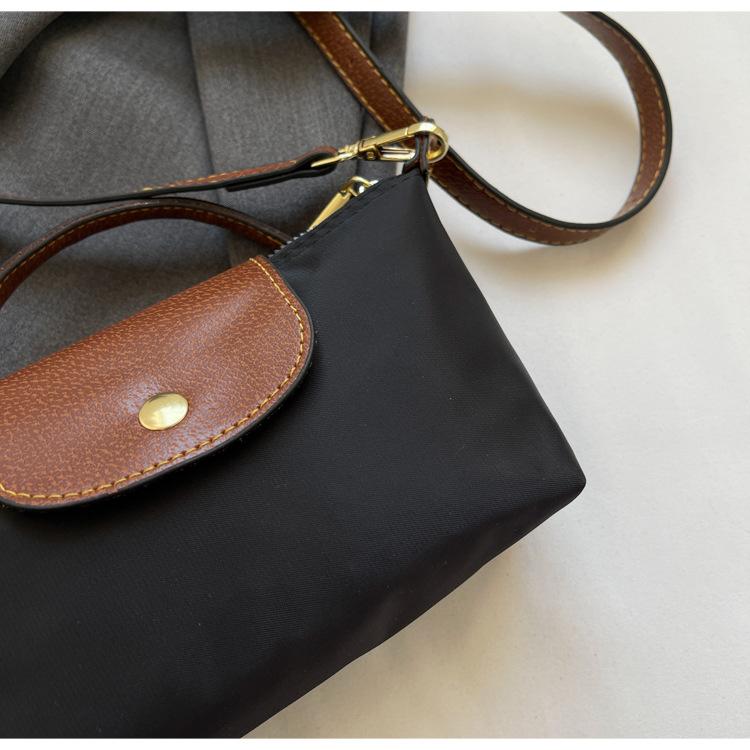 Product Introduction of Retro Explosions Handbag Shoulder Crossbody Bag Carrying High-grade Nylon Jiaozi Bag. 23