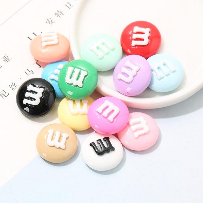 Sticker jibbitz gắn dép sục Crocs hình kẹo M&M với chữ M in nổi