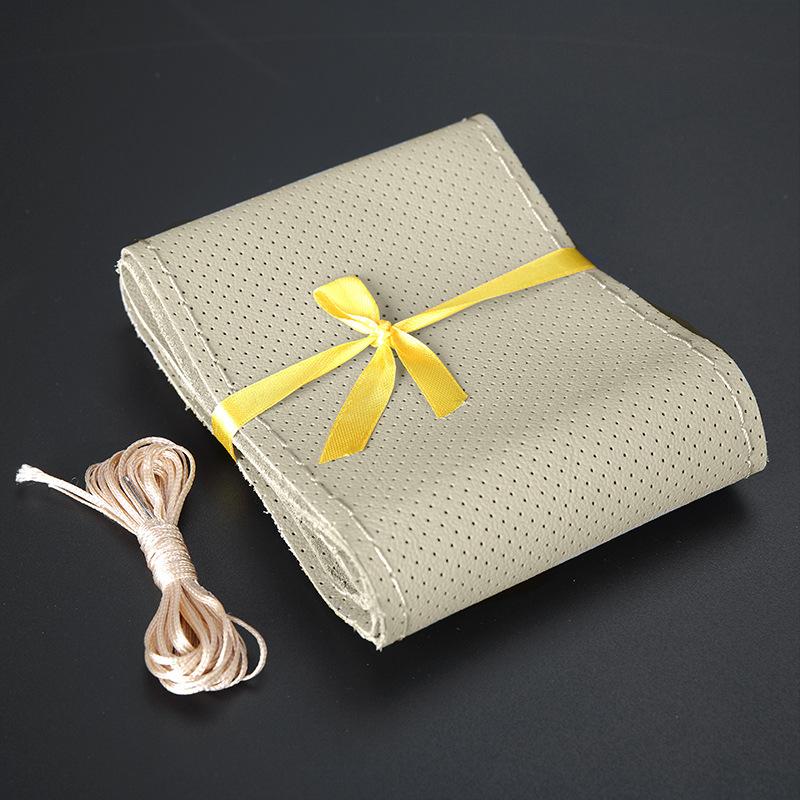 Product Introduction of Hand Shears Leather Steering Wheel Cover Leather Layer Handle Cover Non-Slip Breathable Car Supplies 4