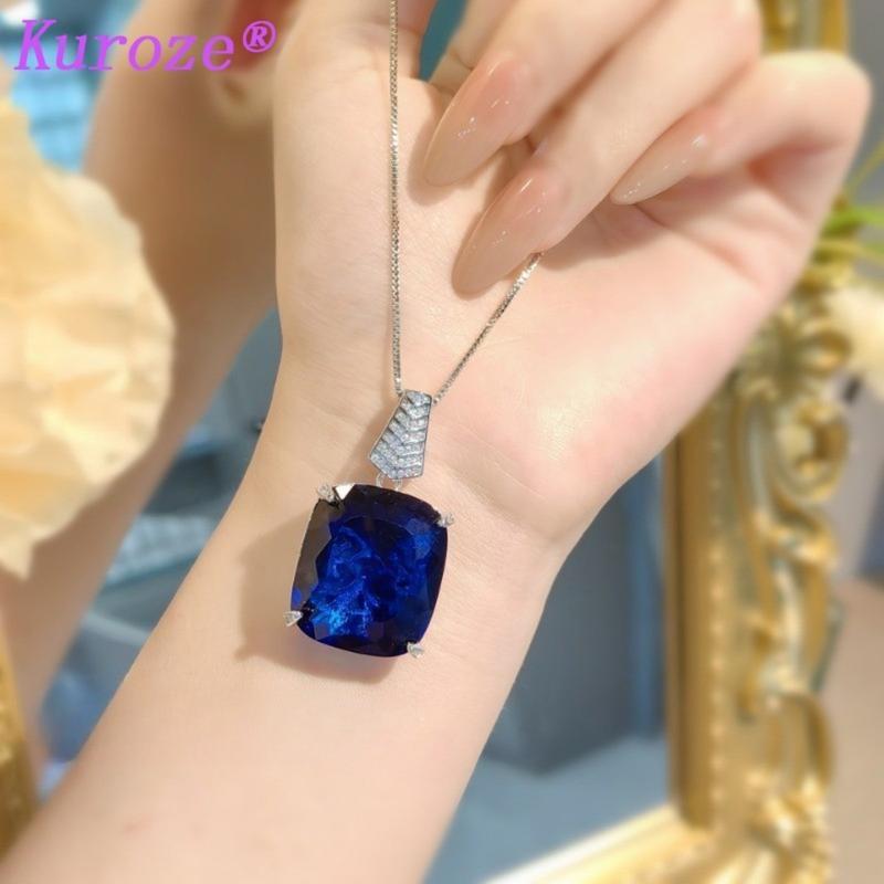 Product Introduction of Kuroze new royal blue pigeon blood red pendant large carat fat square colored treasure earrings Paraiba ring green diamond suit women 23