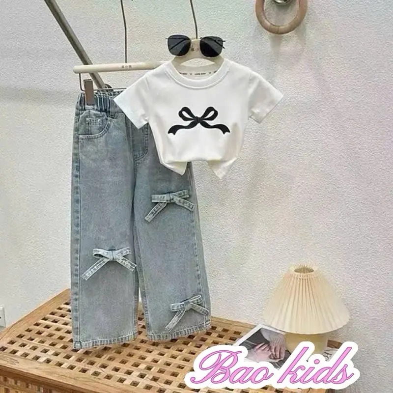 Sét quần bò đính nơ cho bé 1