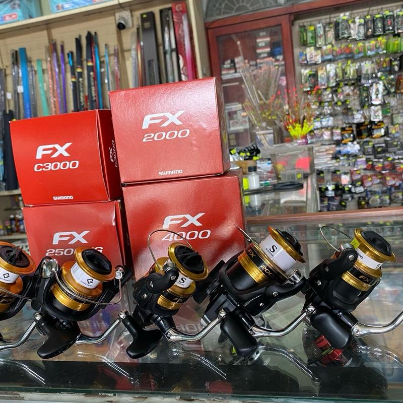 Máy SHIMANO FX CHÍNH HÃNG của Nhật 1000.2000.2500.4000.Chuyên lure câu cá chép và câu ngâm .Câu Cá