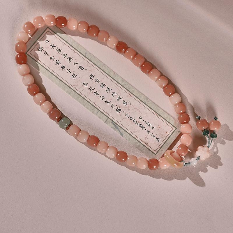 Product Introduction of Pink white jade bodhi root bracelet Female circular finger soft play bodhi Buddha beads student disk play gradient bracelet 13