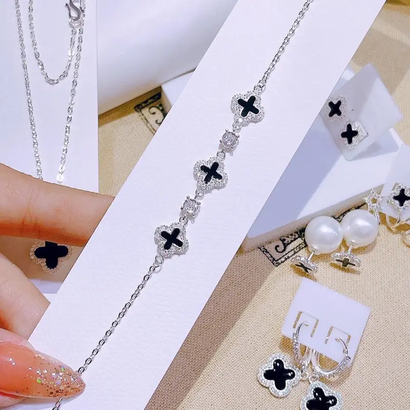 Set Bộ Trang Sức Cỏ 4 Lá Sơn Màu Đen Viền Đá Có Lẻ Món ( Dây - Bông - nhẫn hở - lắc tay ) Cho  Phụ nữ HTJ 3