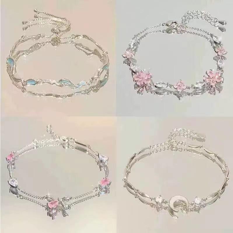 Product Introduction of Vòng Tay Nơ Hoa Anh Đào, Màu Hồng, Dành Cho Phụ Nữ, Phong Cách Ins, Ngọt Ngào, Với Mặt Trăng Nước Và Sóng Biển, Thời Trang vong  tay  cuaduongdomic 0