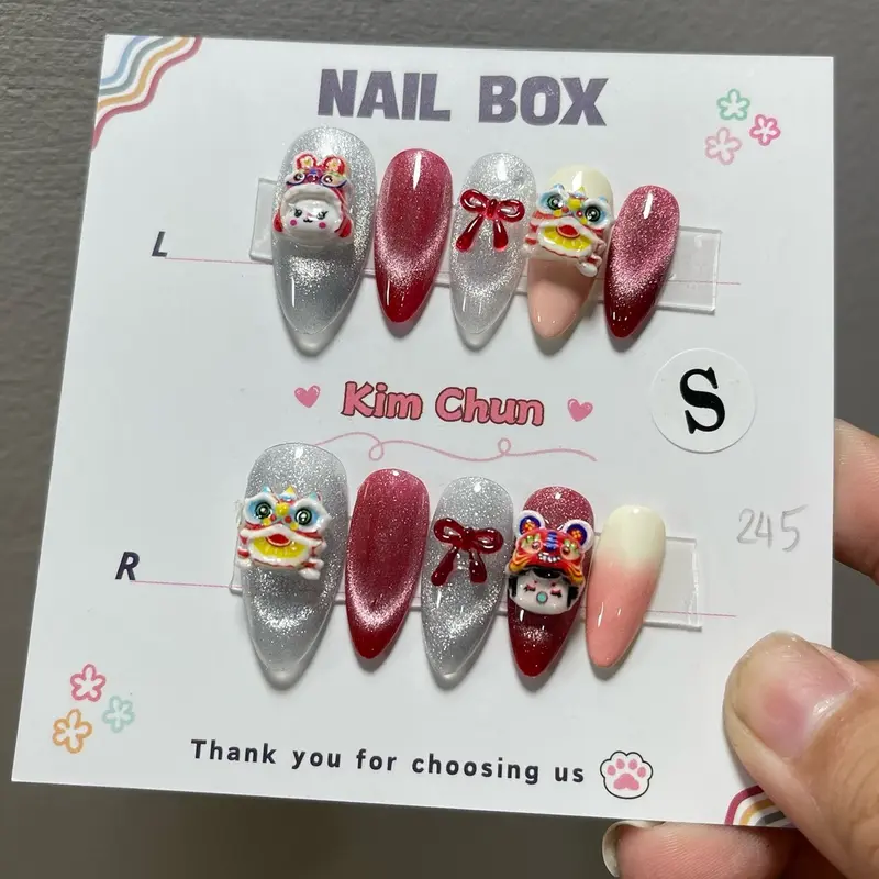 CT01: Nailbox thiết kế Tết 2025 (charm Lân đủ màu NGẪU NHIÊN) form tròn nhọn 0