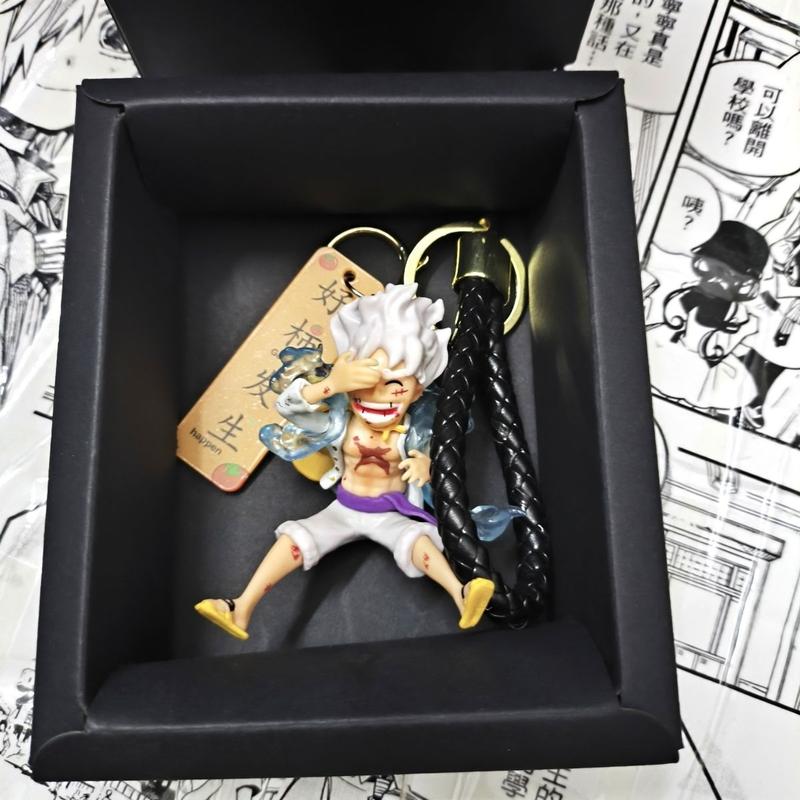 Product Introduction of Móc Chìa Khóa One Piece NICKA Luffy, Thiết Kế Vua Hàng Hải Bánh Răng Thứ Năm Mặt Dây Chuyền Cặp Sách Học Sinh Apollo, Quà Tặng Cho Bé Trai, Phụ Kiện Mặt Dây Chuyền Cá Tính Hoa Móc Khoá Nữ 8