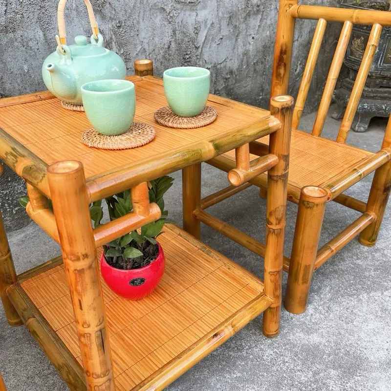 Bộ bàn trà 2 ghế bằng tre, thiết kế ghế dựa lưng, nhỏ gọn phù hợp không gian sân vườn , góc nhà hoặc hiên nhà. 1 bộ gồm bàn và 2 ghế 4