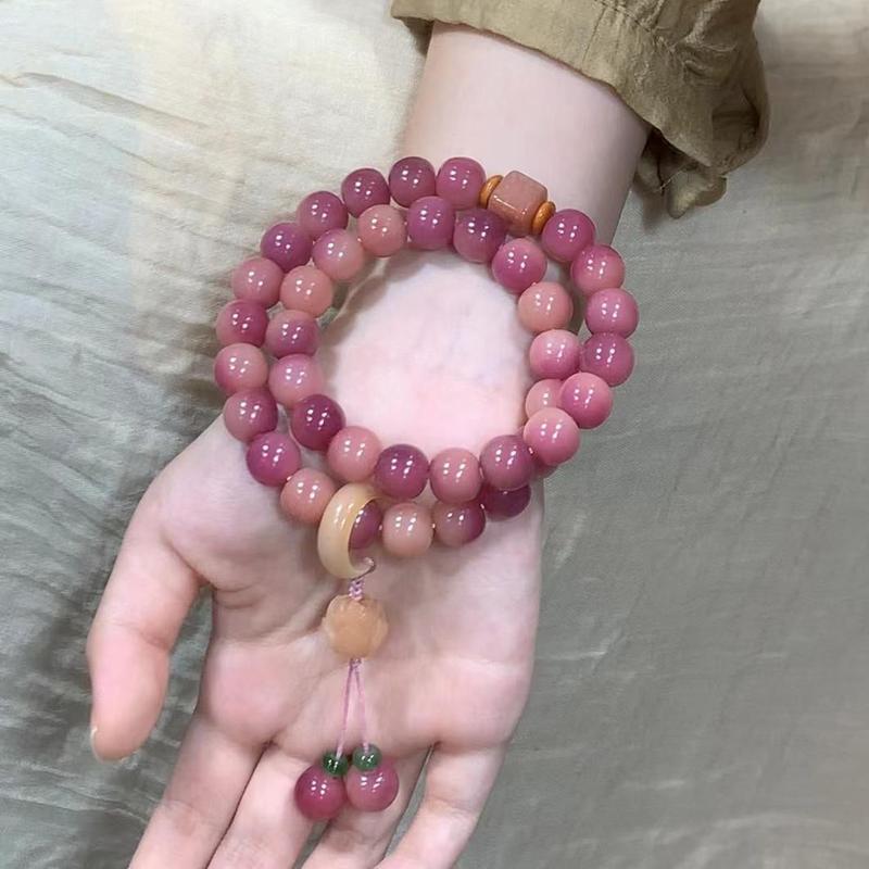 Product Introduction of Pink white jade bodhi root bracelet Female circular finger soft play bodhi Buddha beads student disk play gradient bracelet 7