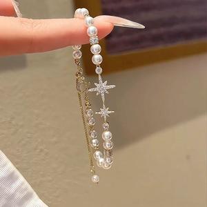 สร้อยข้อมือมุกรูปดาวแปดแฉก สไตล์โรแมนติกย้อนยุคฝรั่งเศส ดีไซน์เก๋ไก๋และสง่างาม บุคลิกภาพประณีตและหลากหลาย เหมาะสำหรับแฟชั่น สร้อยข้อมือแฟชั่น